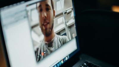 Image of laptop computer with video conference call in progress